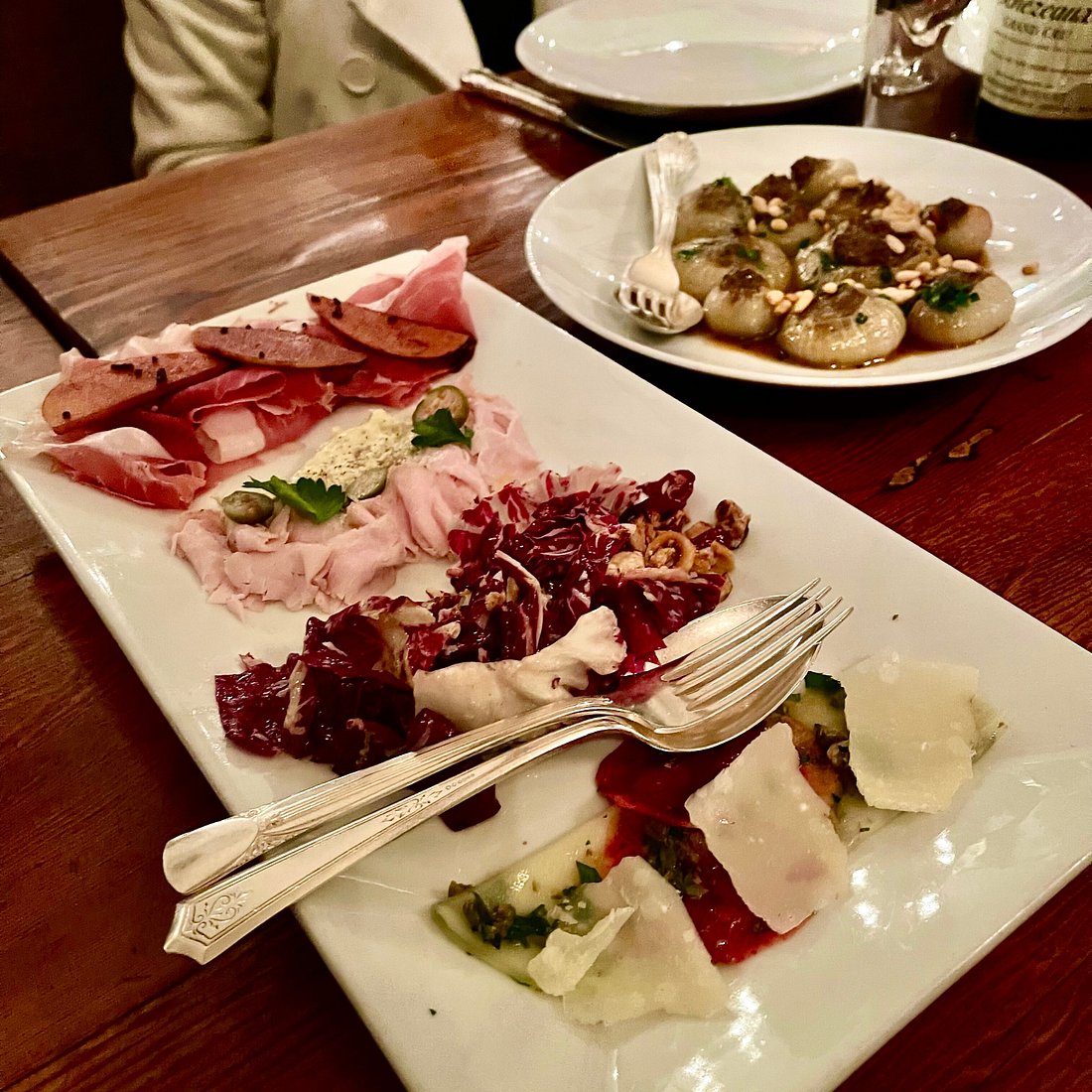 Spinasse signature dishes Tajarin al Ragu o Burro e Salvia (fine egg pasta with meat sauce or butter and sage), and seasonal antipasti.